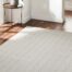 Minimalistic coastal entryway rug